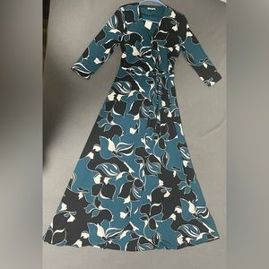 Dark green with black and white design dress. Cato Fashion, size SP.